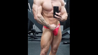 Ripped bodybuilder flexing hard oiled muscles | muscle worship | 