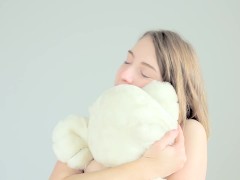 Hot naked blonde cuddling her teddy bear - Screenshot 10 of 16 - Young