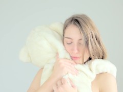Hot naked blonde cuddling her teddy bear - Screenshot 15 of 16 - Young