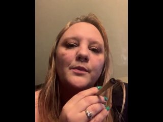solo female, vertical video, blowing smoke, curvy