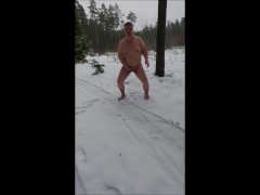 Jerking fully naked in winter forest