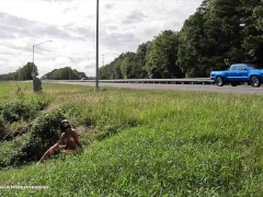Crawling completely naked in public next to the road