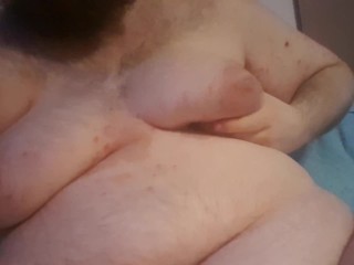 Chubby Plays with his Fat Tits