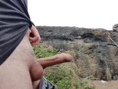 Jerking my dick near the ocean hiding behind rocks in public