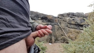 Jerking my dick near the ocean hiding behind rocks in public