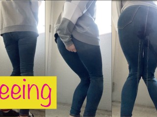 OL Wearing Jeans in Front of a Public Toilet Desperate to Pee