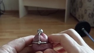 Cumshot through penis urethral plug with glans ring (slow motion cumshot)