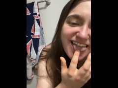 Big beautiful bisexual woman sucks on fingers with her huge tits out on display