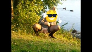 17-Lady In Stocking Pissing On Outdoor In Golden Rain