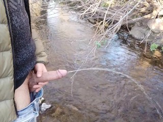 Pissing in the river on a beautiful day