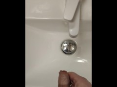 Jerking im public restroom finisched with piss