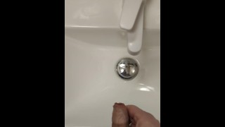 Jerking im public restroom finisched with piss