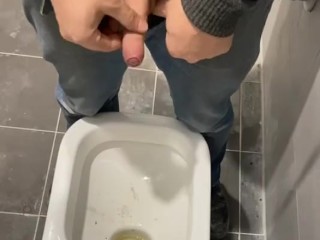 Man peeing in toilet