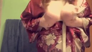Redhead plays with tits