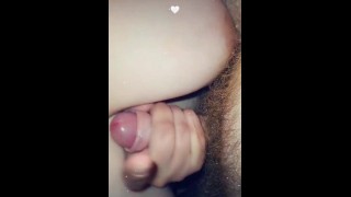 Slut loves it when hard cock jerks between her big tits