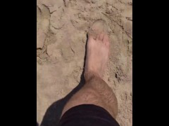 FTM hairy bare feet wandering through public beach & getting cleaned 