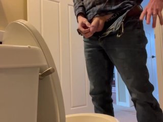 Candid shot of guy Pissing.