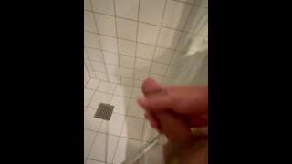 Cumshot in hotel shower