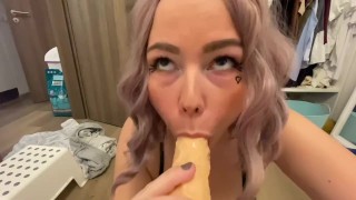 Busty Beauty plays with milk while sucking Dildo Cock