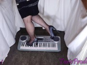 Preview 2 of Synth keyboard crushed under her sexy heels