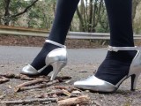 Outdoor LeatherWomen's high heels crush and crush tree branches with a crash fetish.