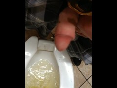 Pissing in public bathroom