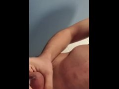 Young man masturbating in changing room