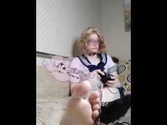 Sexy cute gamer sissy crossdresser in school uniform shows feet and ignoring you