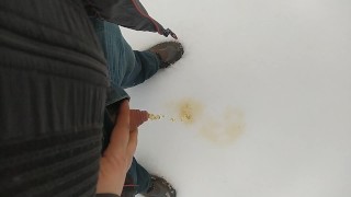 Pee on snow outdoor