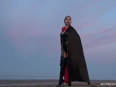 Caped Mistress by the Ocean