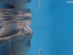 Cute blonde Finnish pornstar Mimi Cica underwater