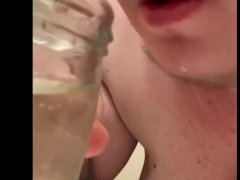 Drinking an overflowing cup of piss 