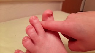 Girlfriend shows off her cute feet and causes pleasure