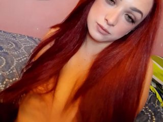 Dirty Talk Red Head Shaking Her Tits.