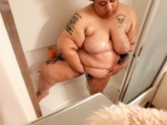BBW showering and rubbing huge tits
