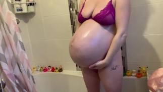 Rubbing my massive pregnant belly for you 