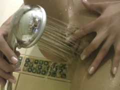 Hottie Gracelina takes a hot shower and plays with her tight gorgeous pussy