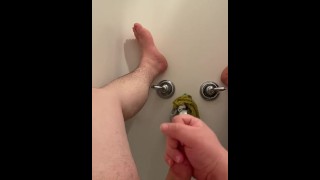 Jacking off in the tub.