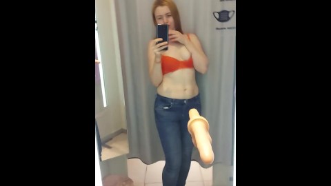 pervert walks around the fitting rooms and fucks herself in front of everyone