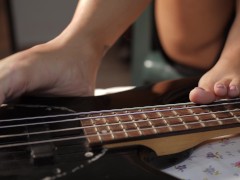 POV Foot fetish Girl petit teenager playing funky bass guitar with her sexy bare feets