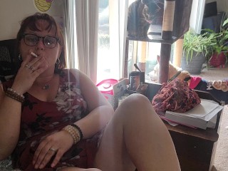 Sexy brunette secretary enjoyinga smoke!