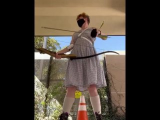Archery practice in a sundress and boots 🖤
