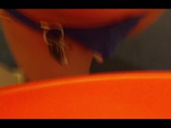 Just wearing a thong while doing laundry in the building