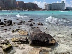 Daring pee on beach in Cancun, Mexico with people around - Screenshot 1 of 16 - Pee