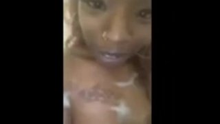 Soapy ebony pleases herself 