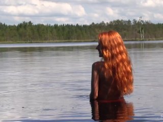 Naked Redhead Teen Plays with a Water Lily