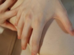 Gorgeous Teen Model Touches Her Body on a White Sofa