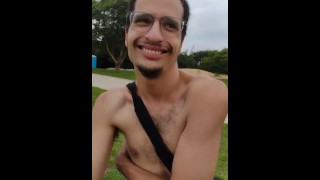 seat shirtless outside home, at the park