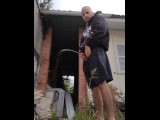 Master peeing in backyard, abandoned house