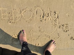 ebony feet on the sand